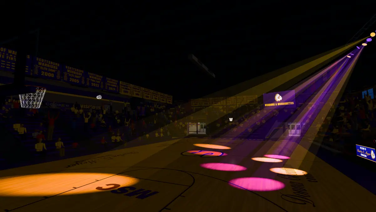 The gym in the dark, purple and gold spotlights sweeping the court